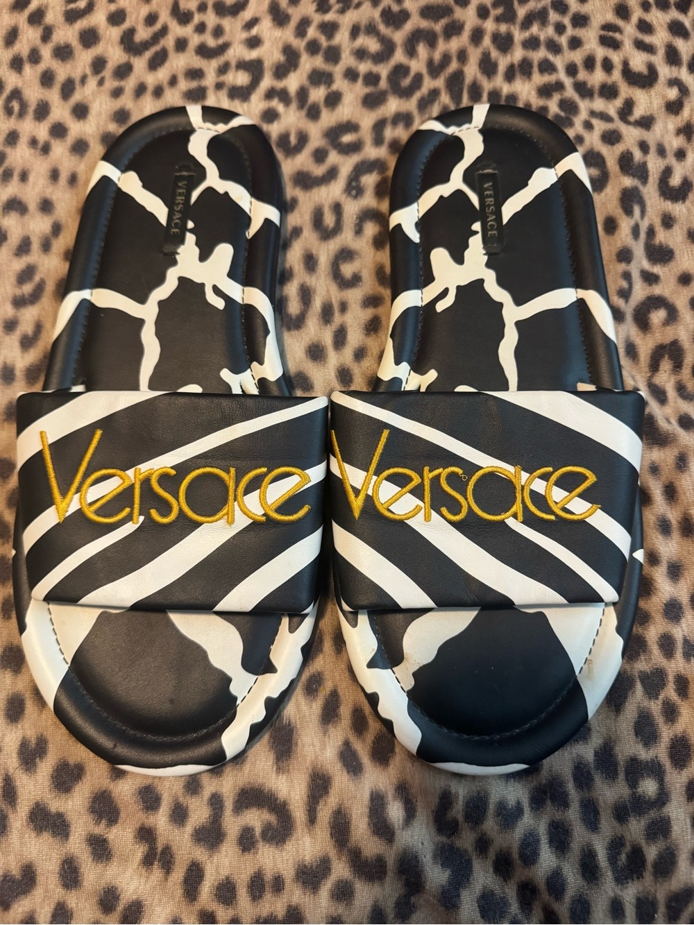 Versace Black and White Zebra-Print Slide Sandals with Gold Logo Accent